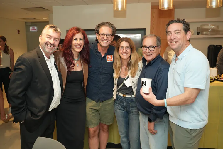 Six friends posing together at the IgniteIt Chicago Bagel Bash